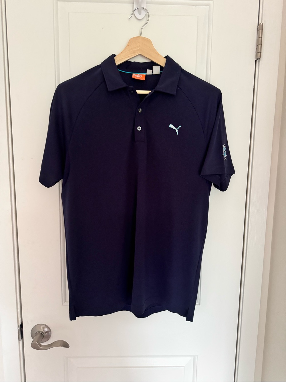 Puma Men’s Navy Polo with Light Blue Logo - Size M